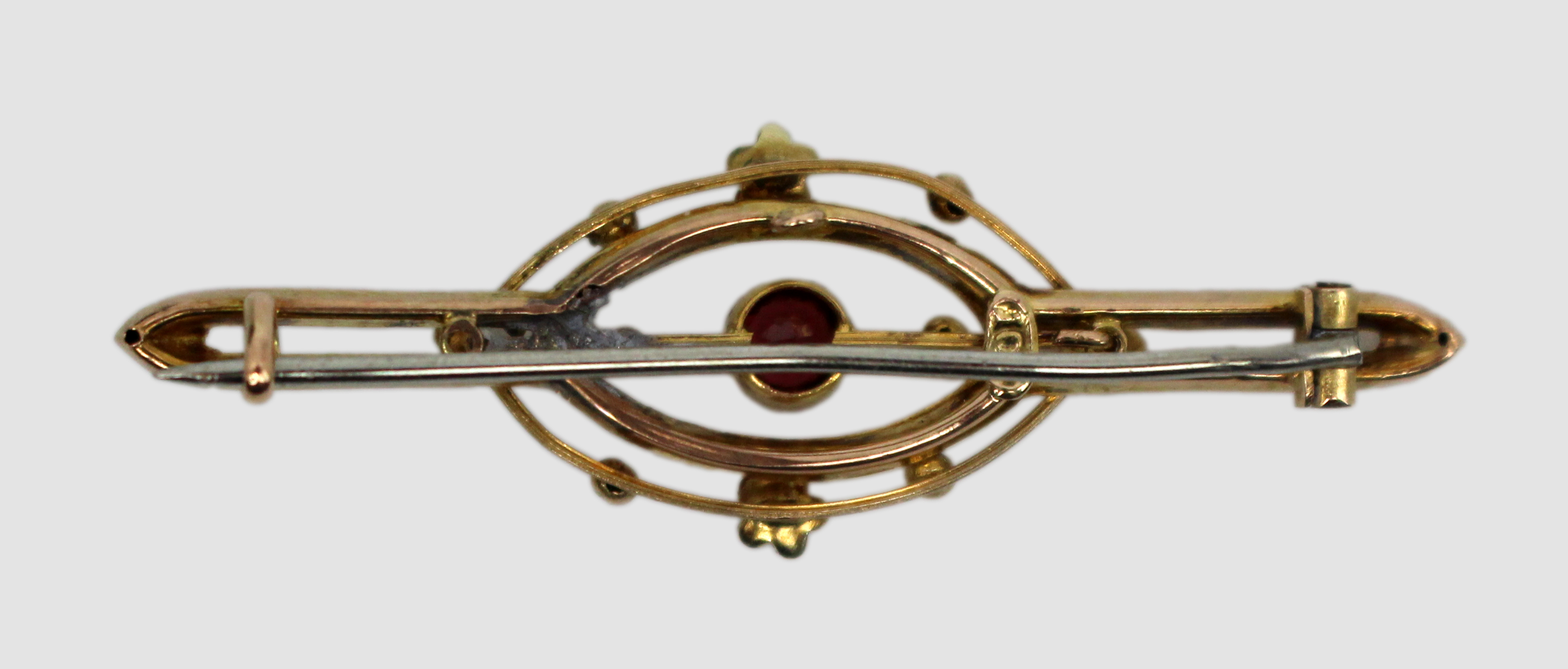 Antique Garnet and 9ct Gold Brooch with Floral Accents