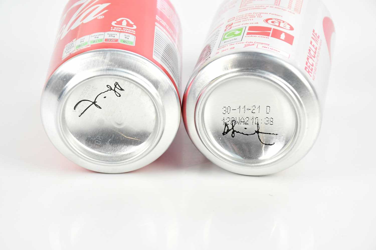 Pair of Signed Coke Cola Limited Edition Cans (With Coke) By Damien Hirst