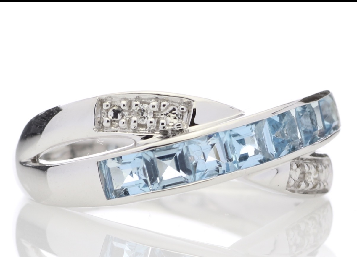 9Ct White Gold Blue Topaz and Diamond Ring (BT1.50) 0.02 Carats