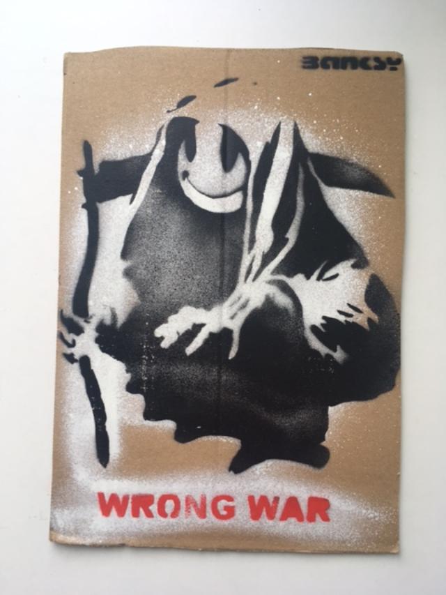 Banksy (b1974) ‘Wrong War’ & 6 Dismaland Bemusement Park Souvenirs Inc Framed Banksy Free Art, 2015