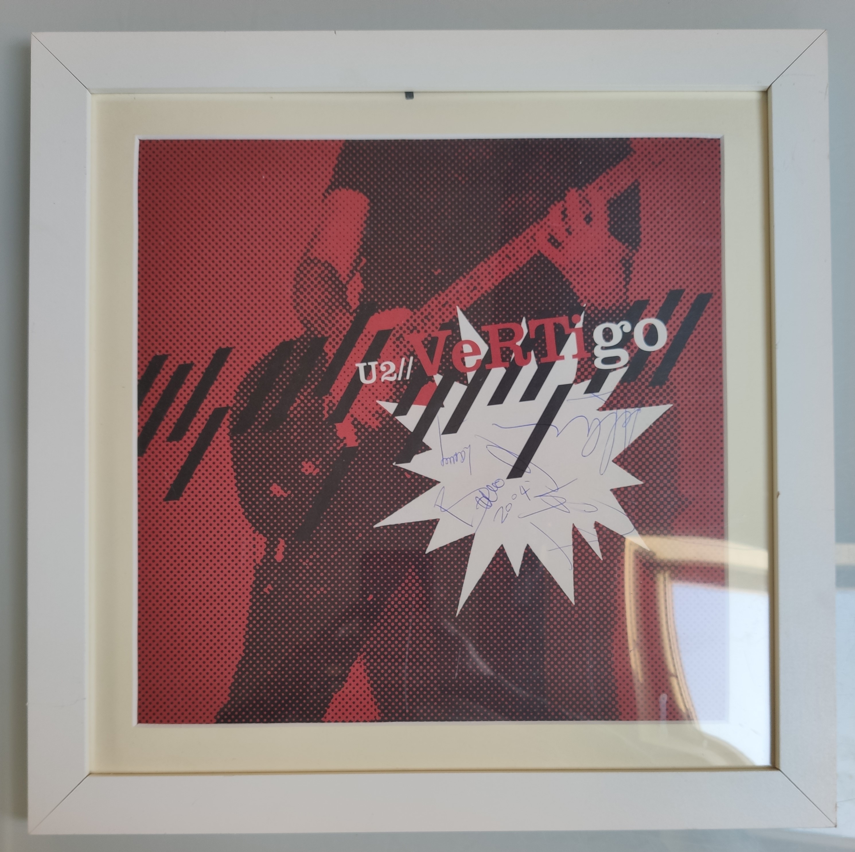 U2 – Vertigo Famed Vinyl Record – Autographed by – Bono, The Edge, Larry Mullen and Adam Clayton.