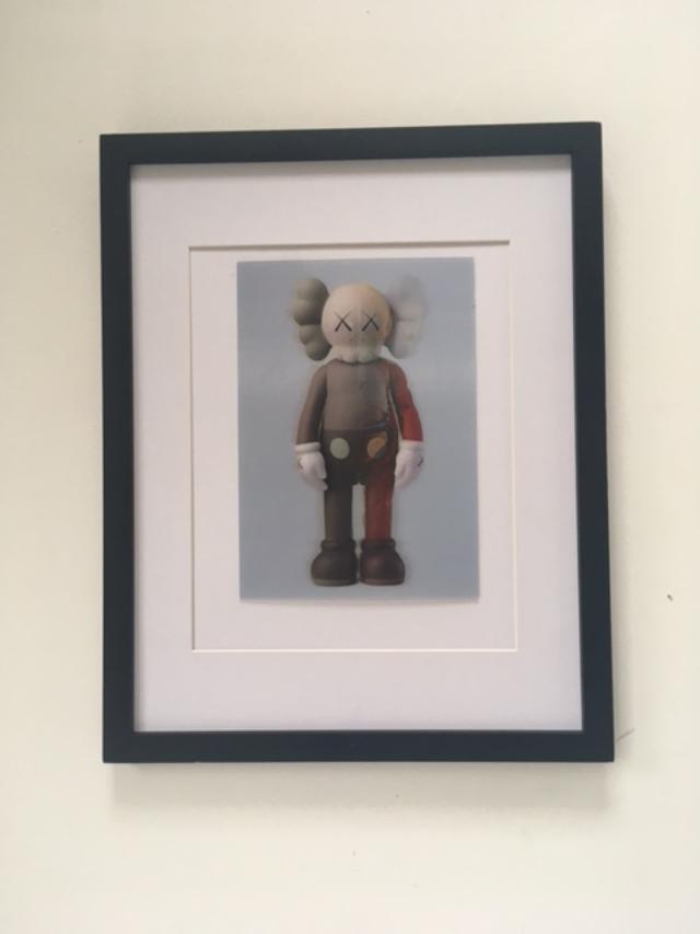 Kaws (b.1974) Import, 3D Lenticular Image Flayed Companion In Brown, Exhibition At NGV, Framed, 2019