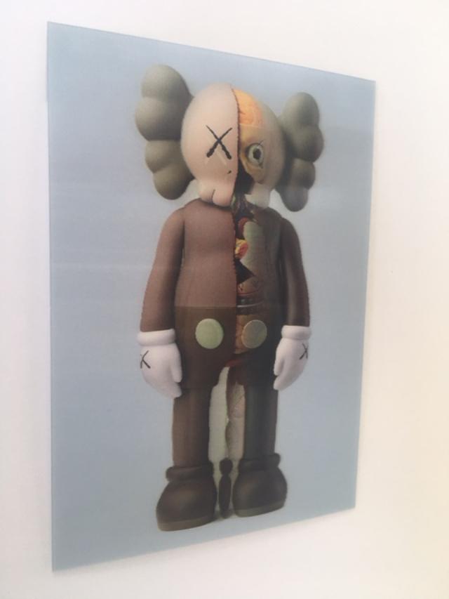 Kaws (b.1974) Import, 3D Lenticular Image Flayed Companion In Brown, Exhibition At NGV, Framed, 2019