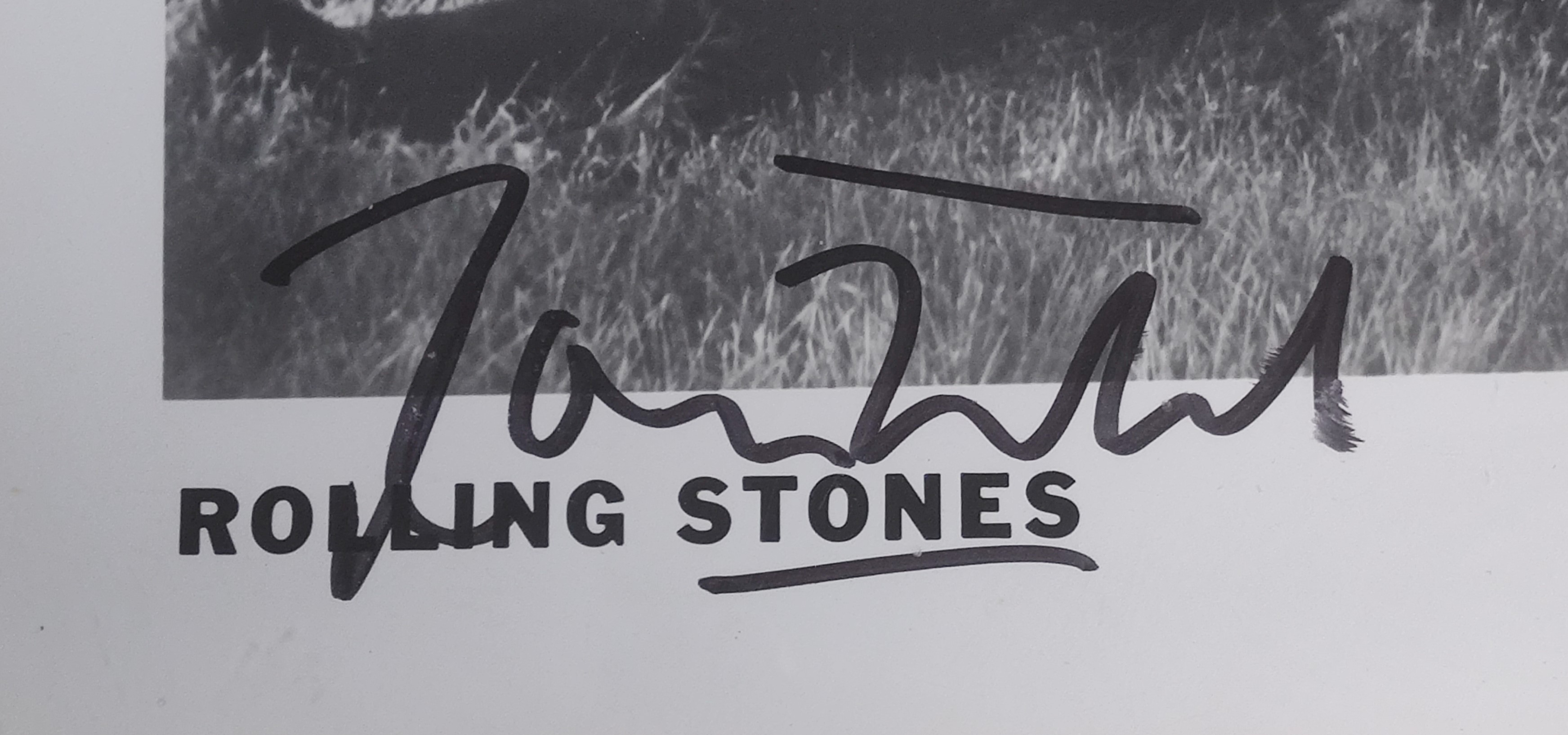 The Rolling Stones autographed Photo by Mick Jagger – Keith Richards – Charlie Watts – Ronnie Wood.