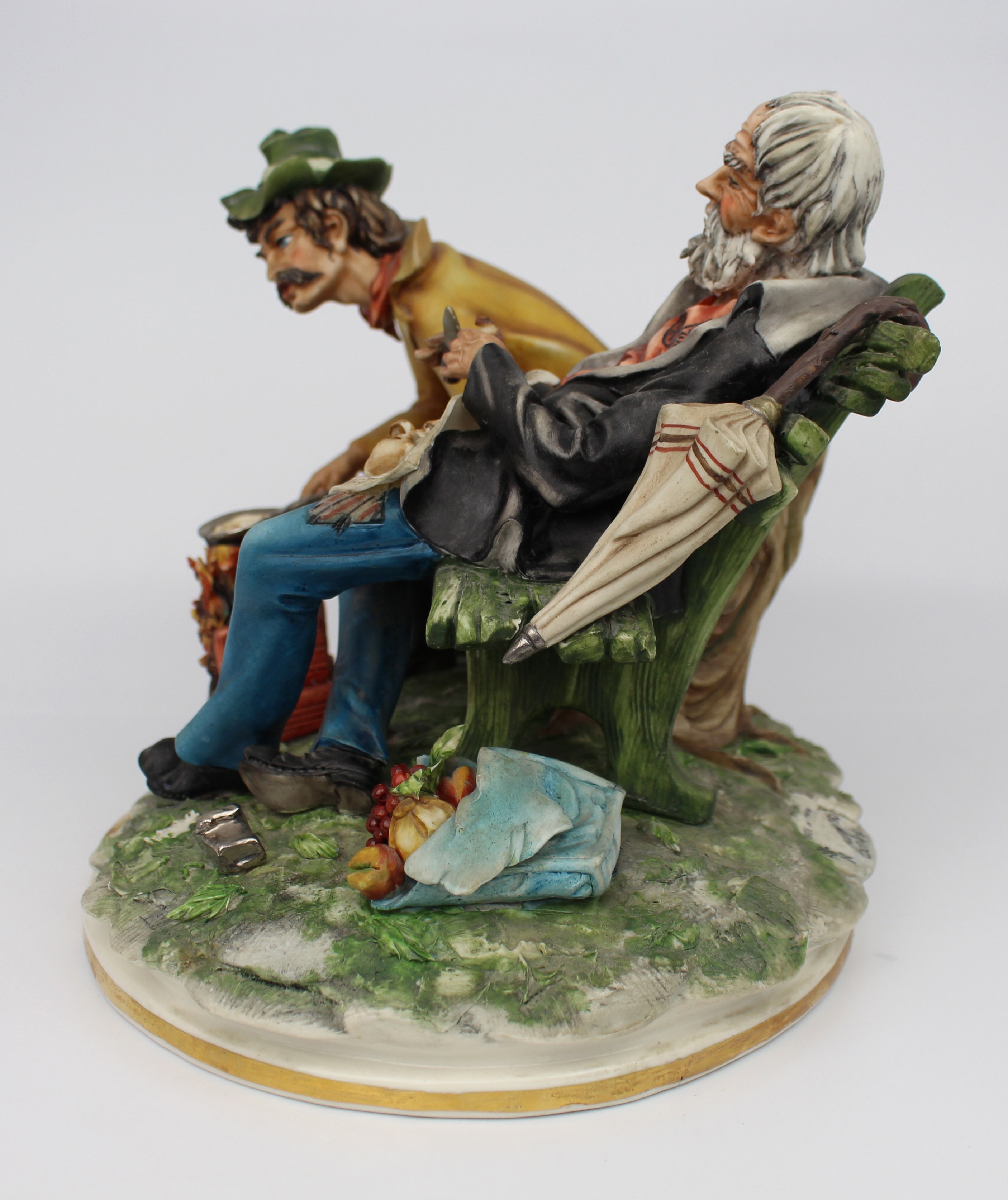Capodimonte Tramps on Bench by Cortese