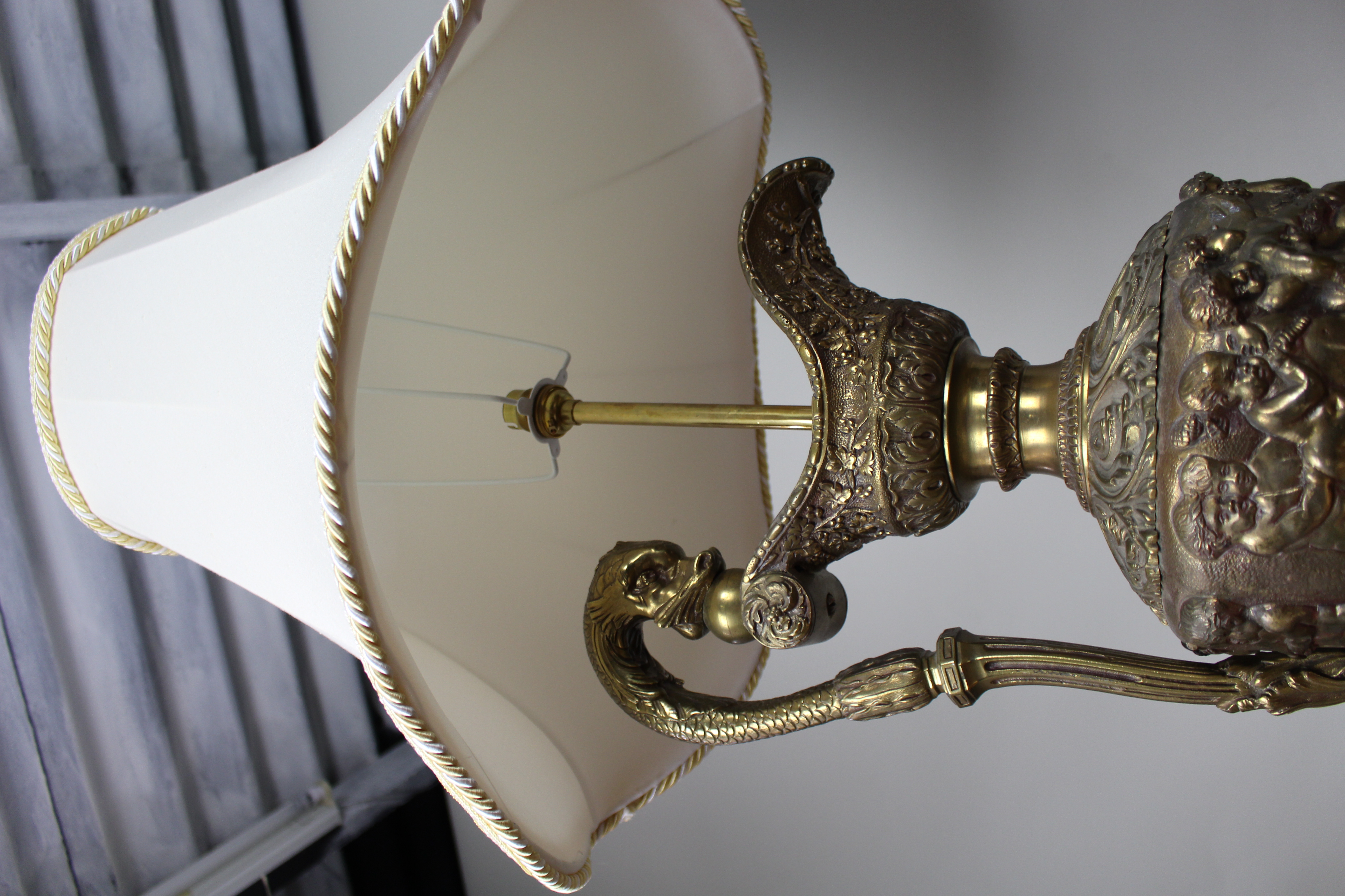 Pair of Early 20th Century French Neoclassical Ewer Lamps with Putti Relief