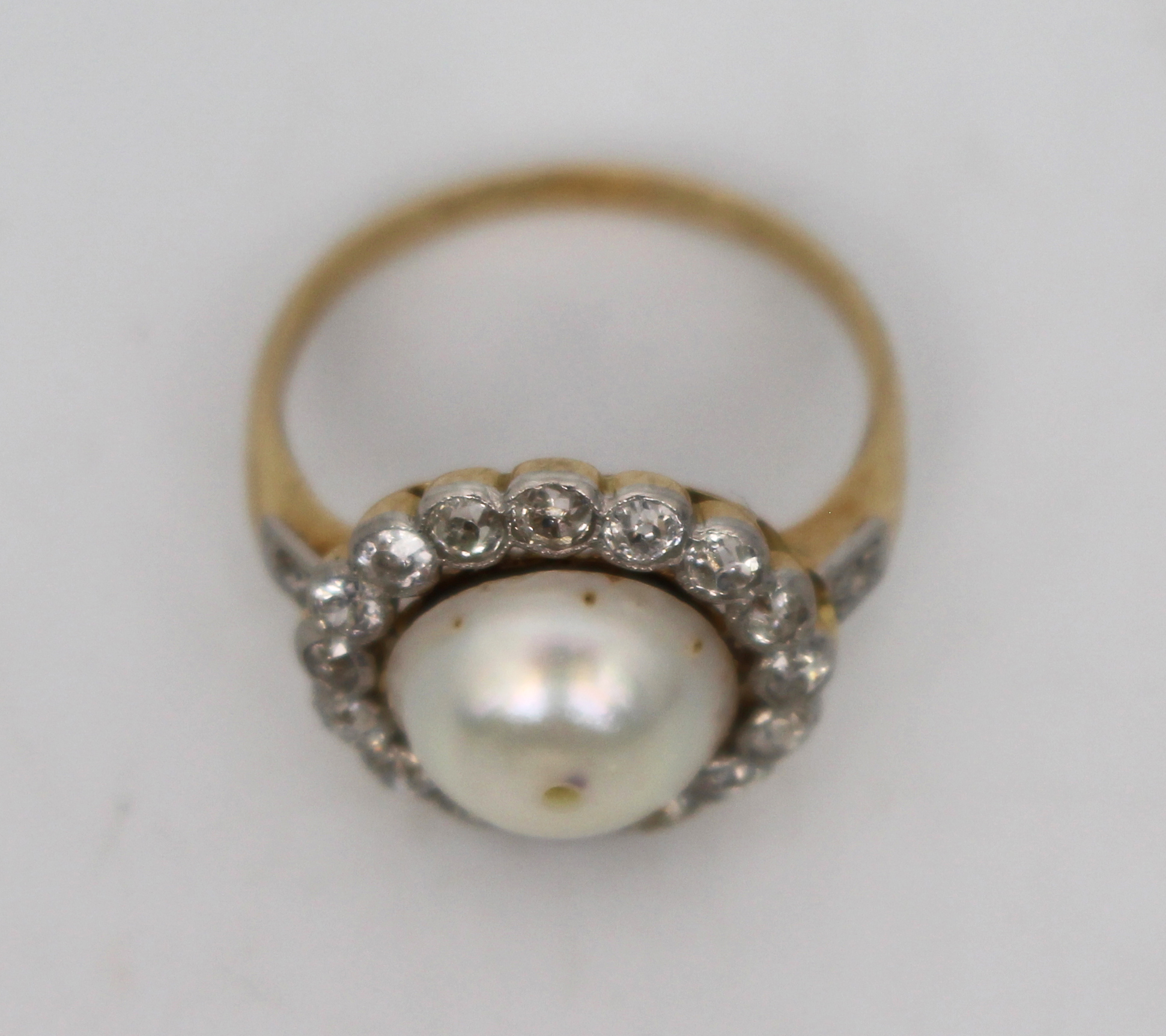 Pearl Set Ring with Diamond Surround