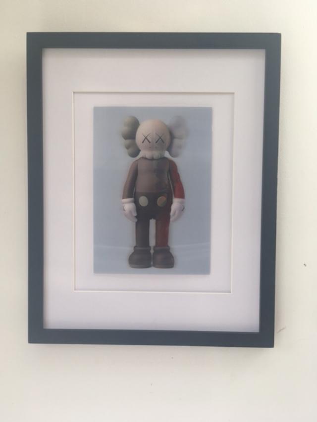 Kaws (b.1974) Import, 3D Lenticular Image Flayed Companion In Brown, Exhibition At NGV, Framed, 2019