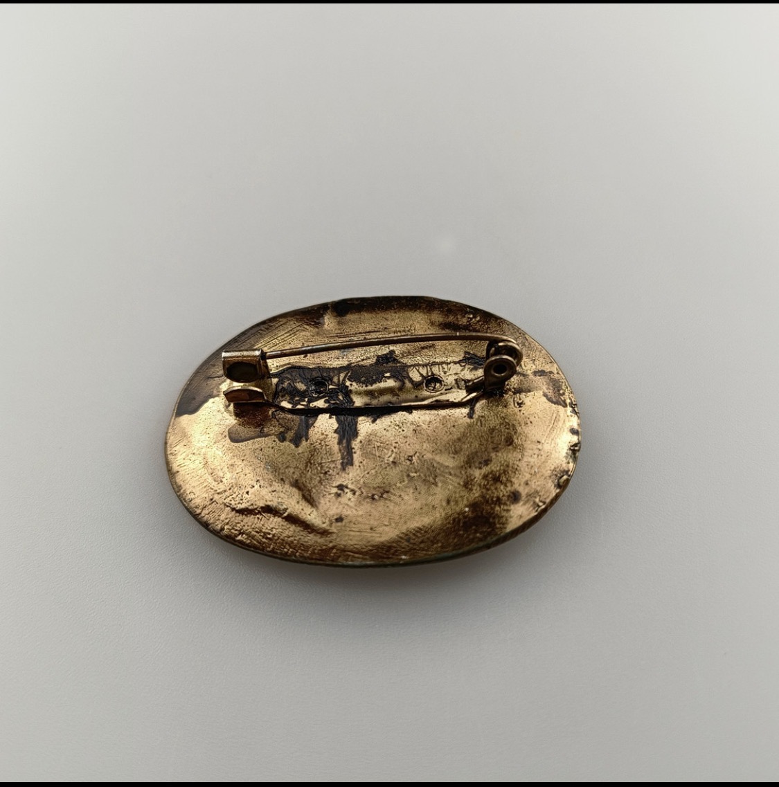 Vintage Renaissance Style Brooch With A Red Cabochon Centre