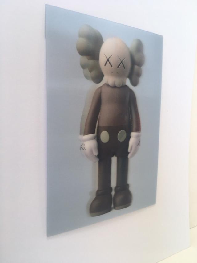 Kaws (b.1974) Import, 3D Lenticular Image Flayed Companion In Brown, Exhibition At NGV, Framed, 2019