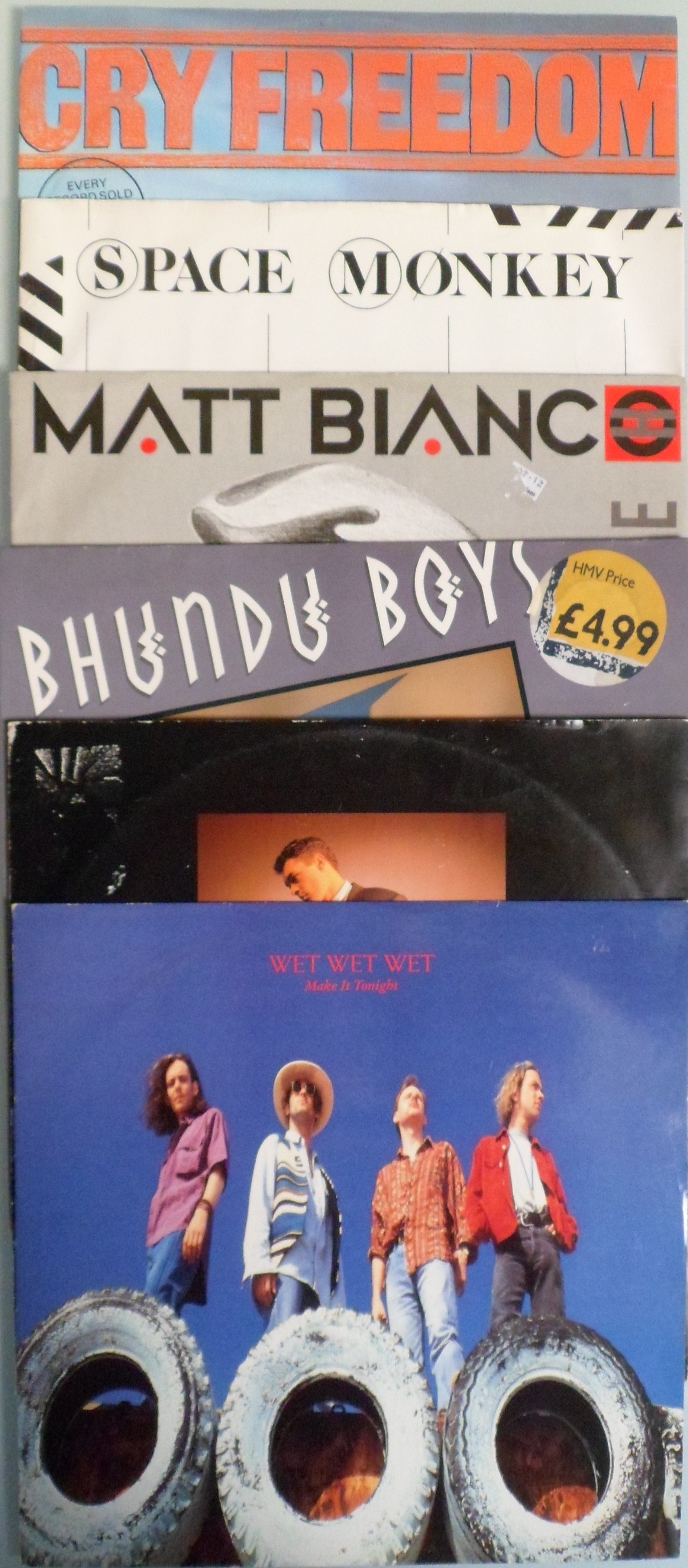 A collection of 30 x Vinyl record LPs and 12" vinyl records.