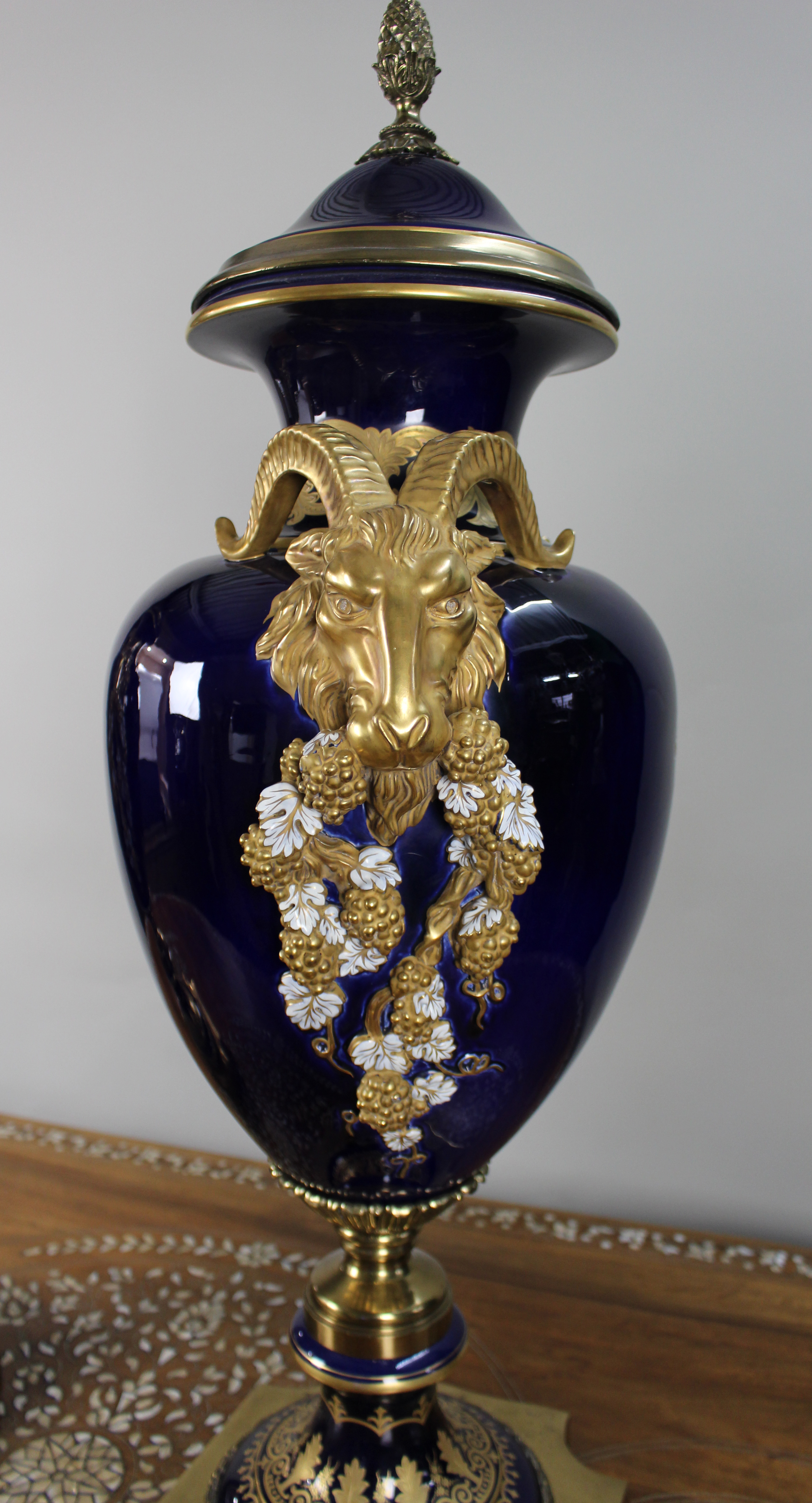 Pair of Fine Sevres Style Cobalt Blue Rams Head Lidded Urns