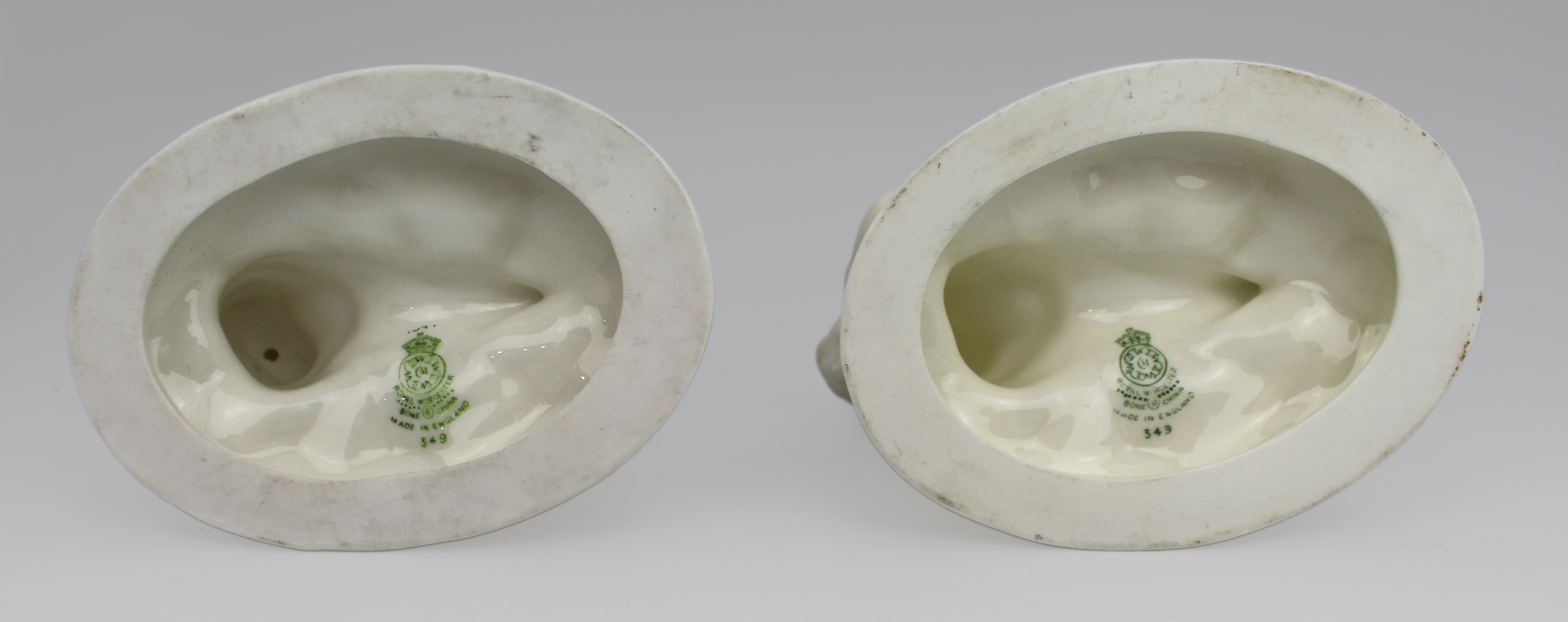 Pair of Royal Worcester Blanc de Chine Merchild Salt Cellars
