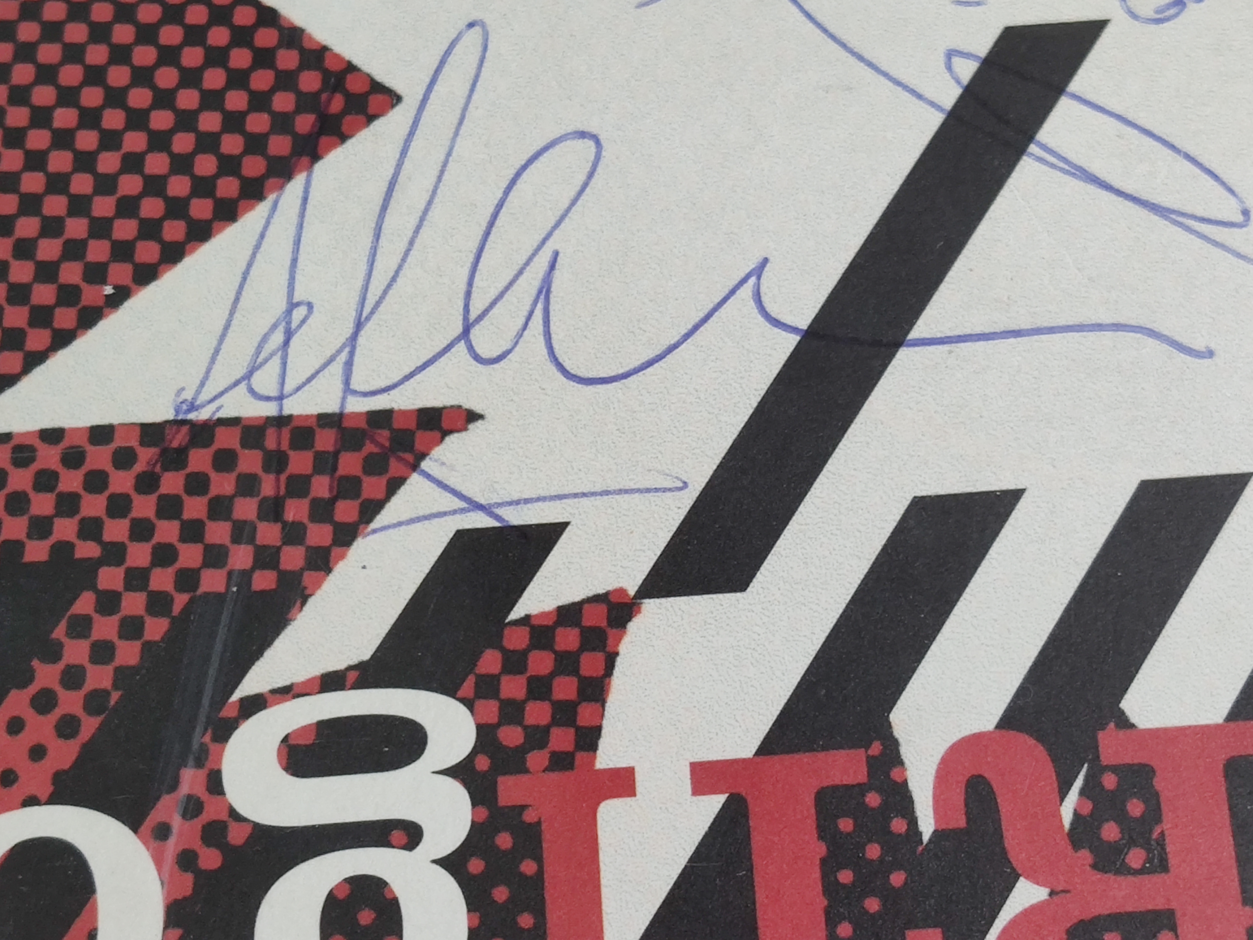 U2 – Vertigo Famed Vinyl Record – Autographed by – Bono, The Edge, Larry Mullen and Adam Clayton.