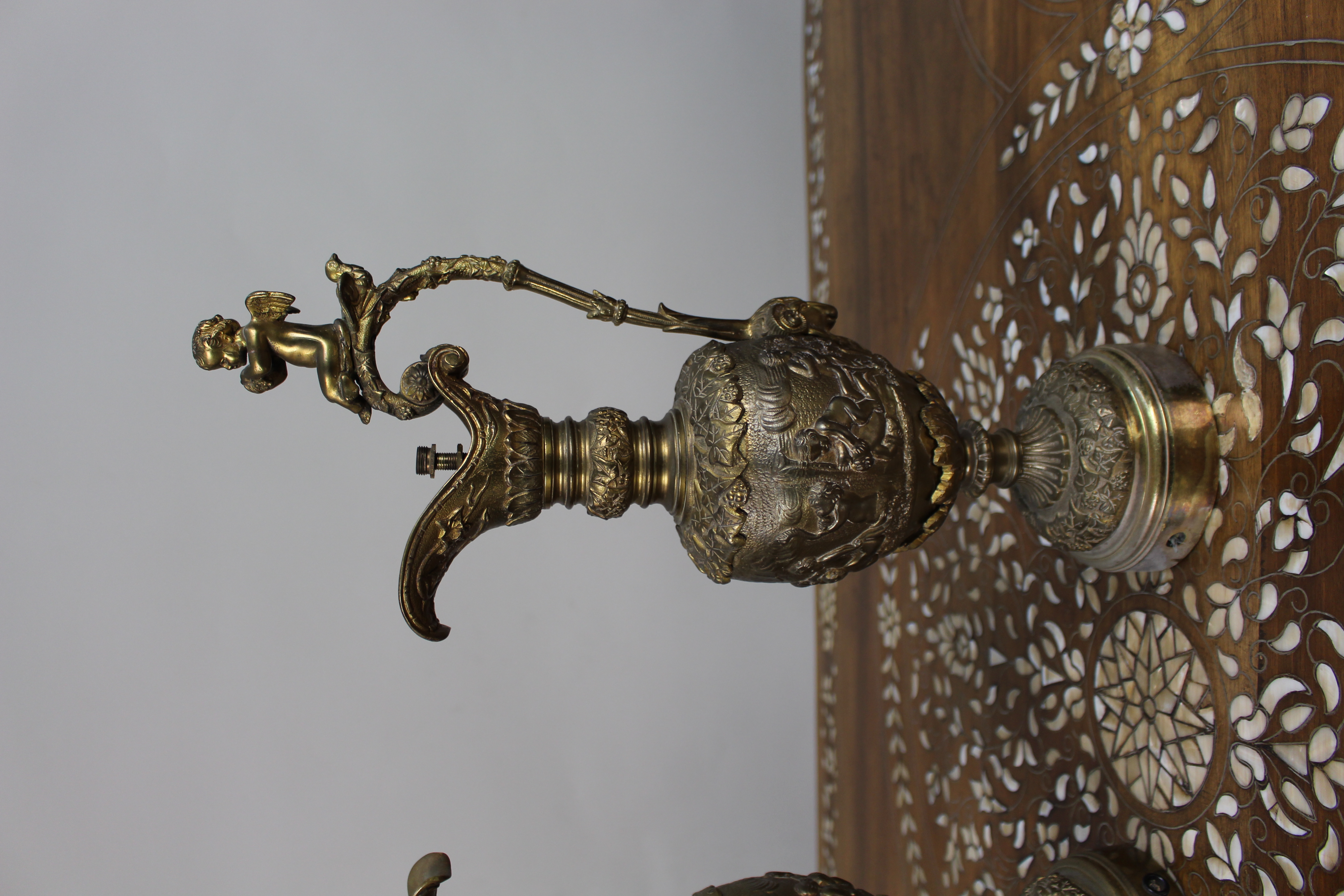Pair of 19th Century French Gilt Bronze Bacchanalian Ewers with Cherubs