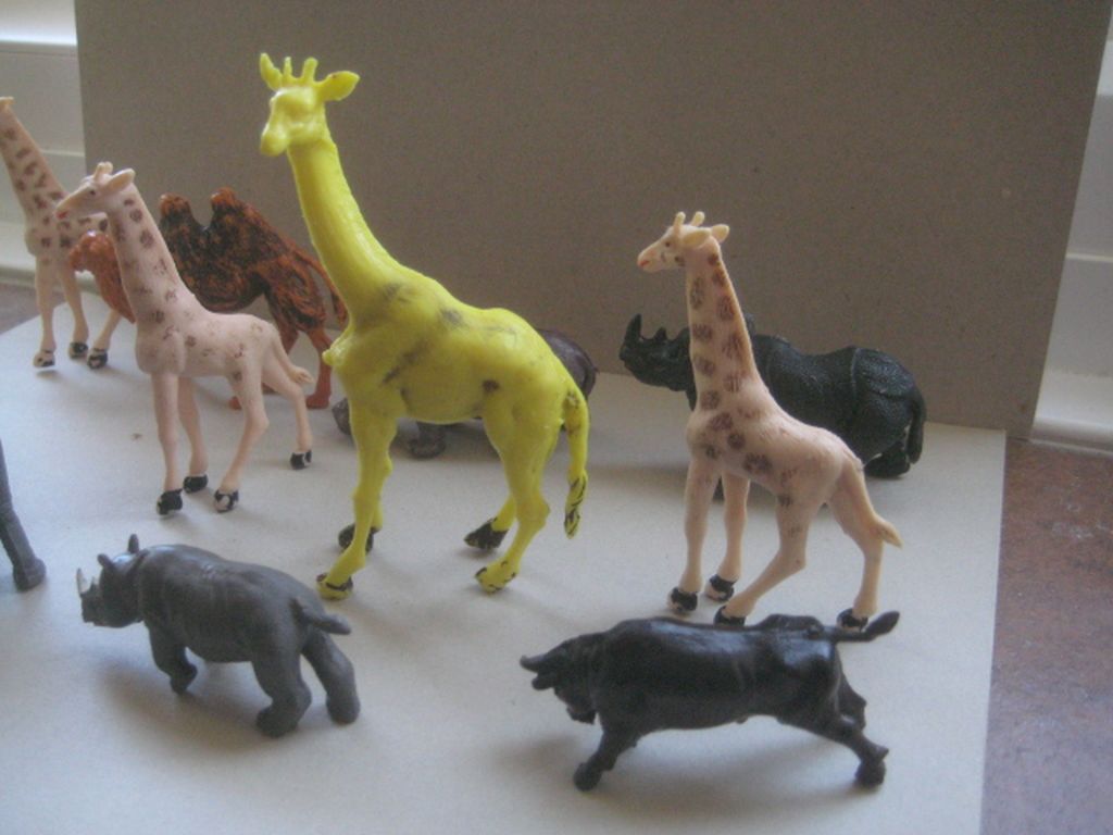 A Group of 12 Vintage Plastic Animals