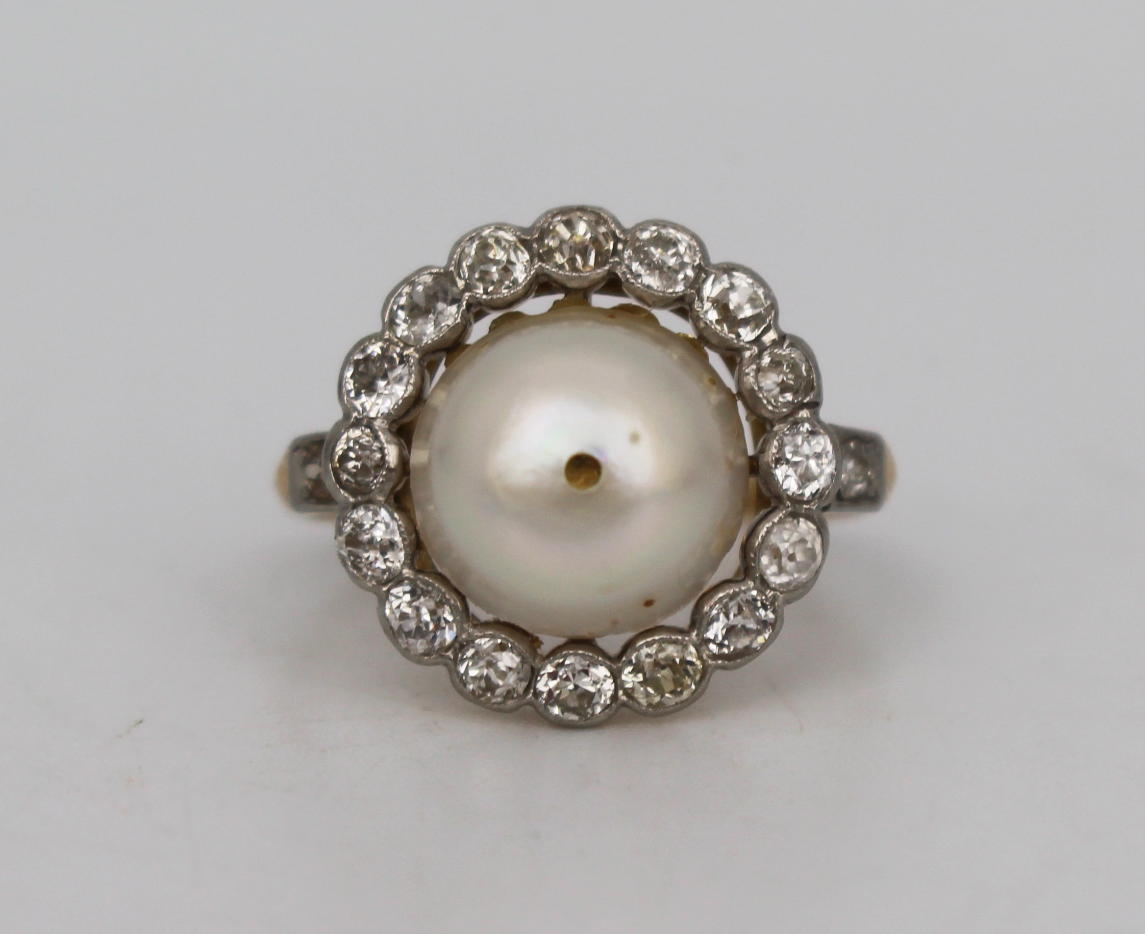 Pearl Set Ring with Diamond Surround