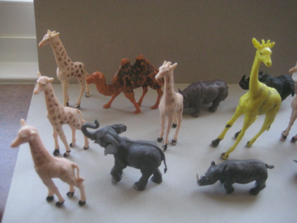 A Group of 12 Vintage Plastic Animals