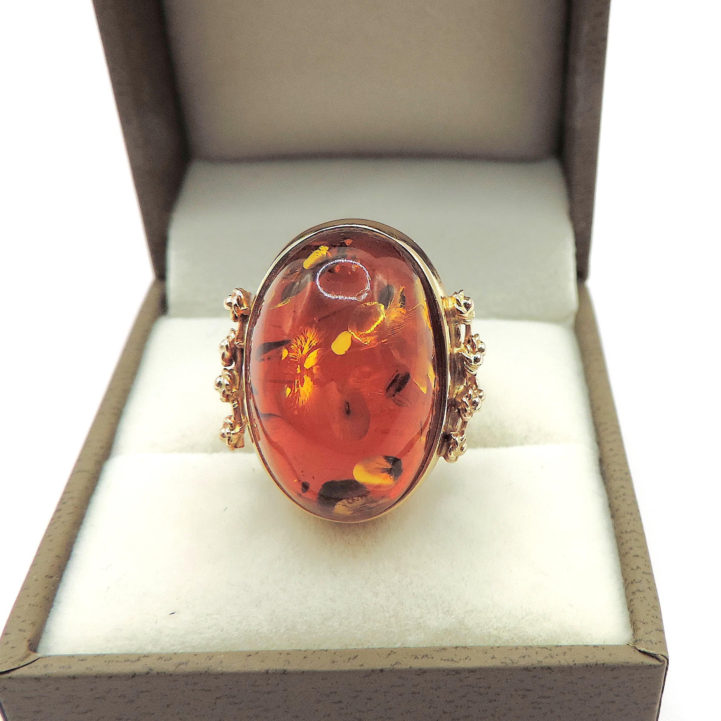 Artisan 14k Gold 23x12mm Cabochon Baltic Amber Ring circa. 1990's.
