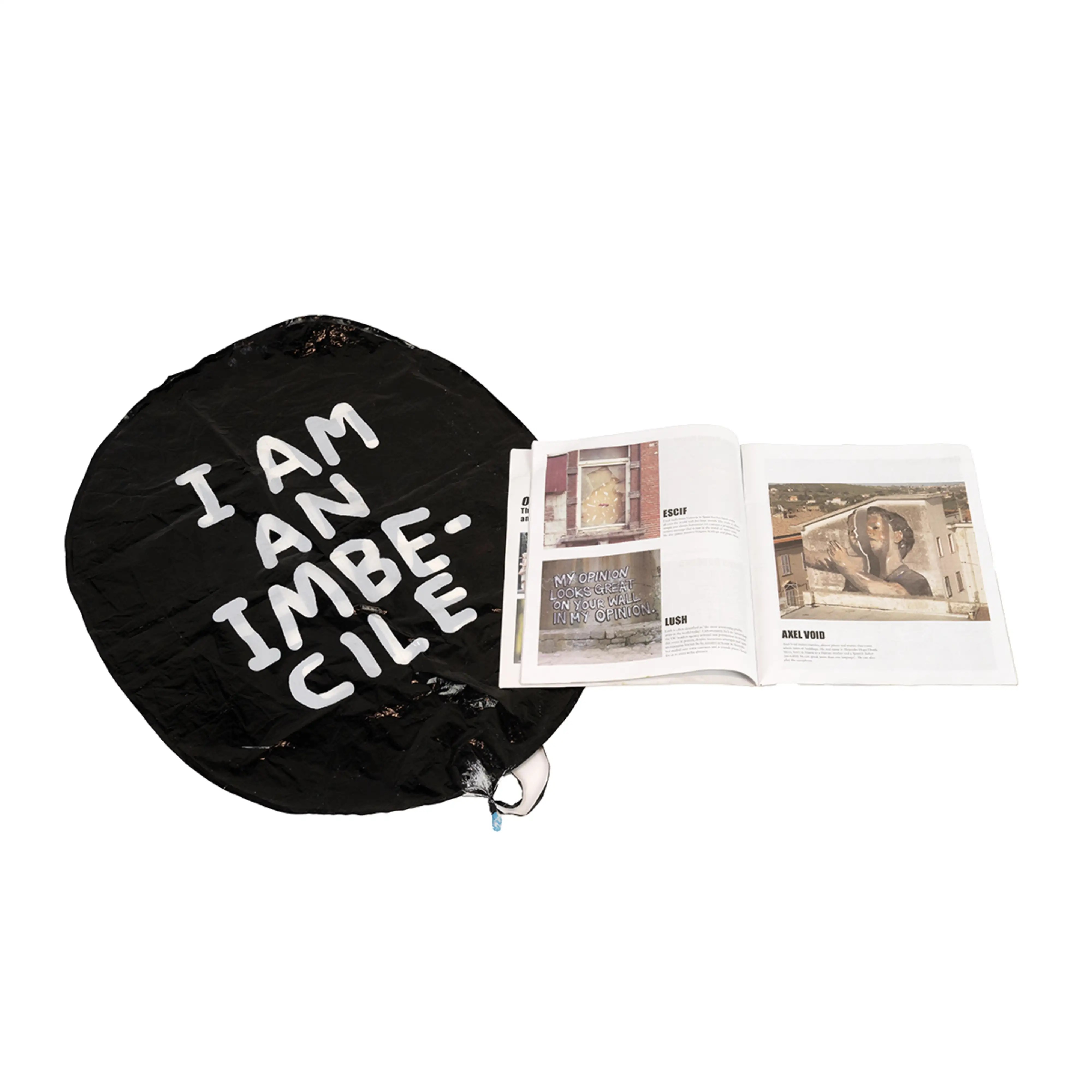David Shrigley OBE (b 1968) ‘I Am An Imbecile’ Balloon, & Official Banksy Dismaland Programme, 2015
