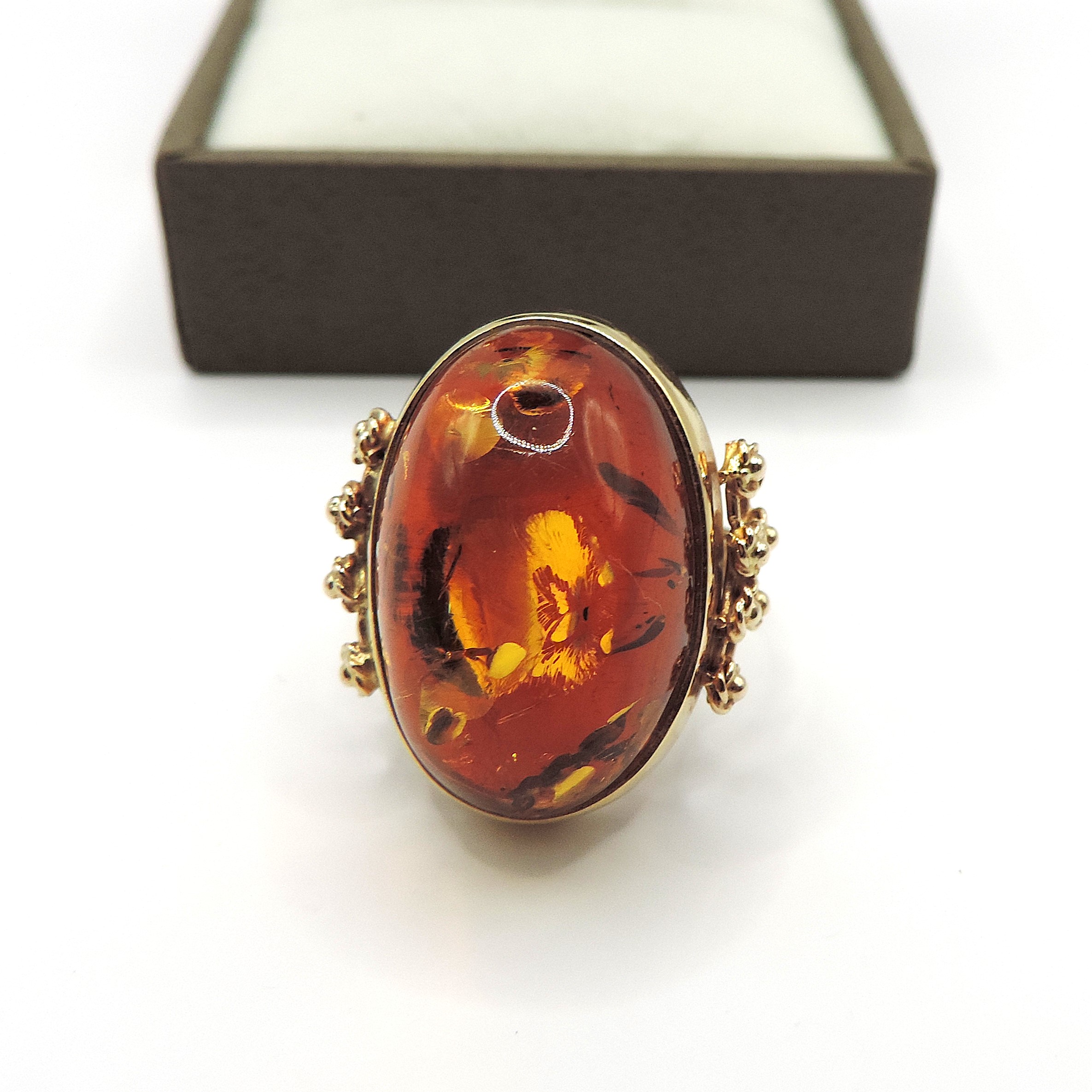 Artisan 14k Gold 23x12mm Cabochon Baltic Amber Ring circa. 1990's.