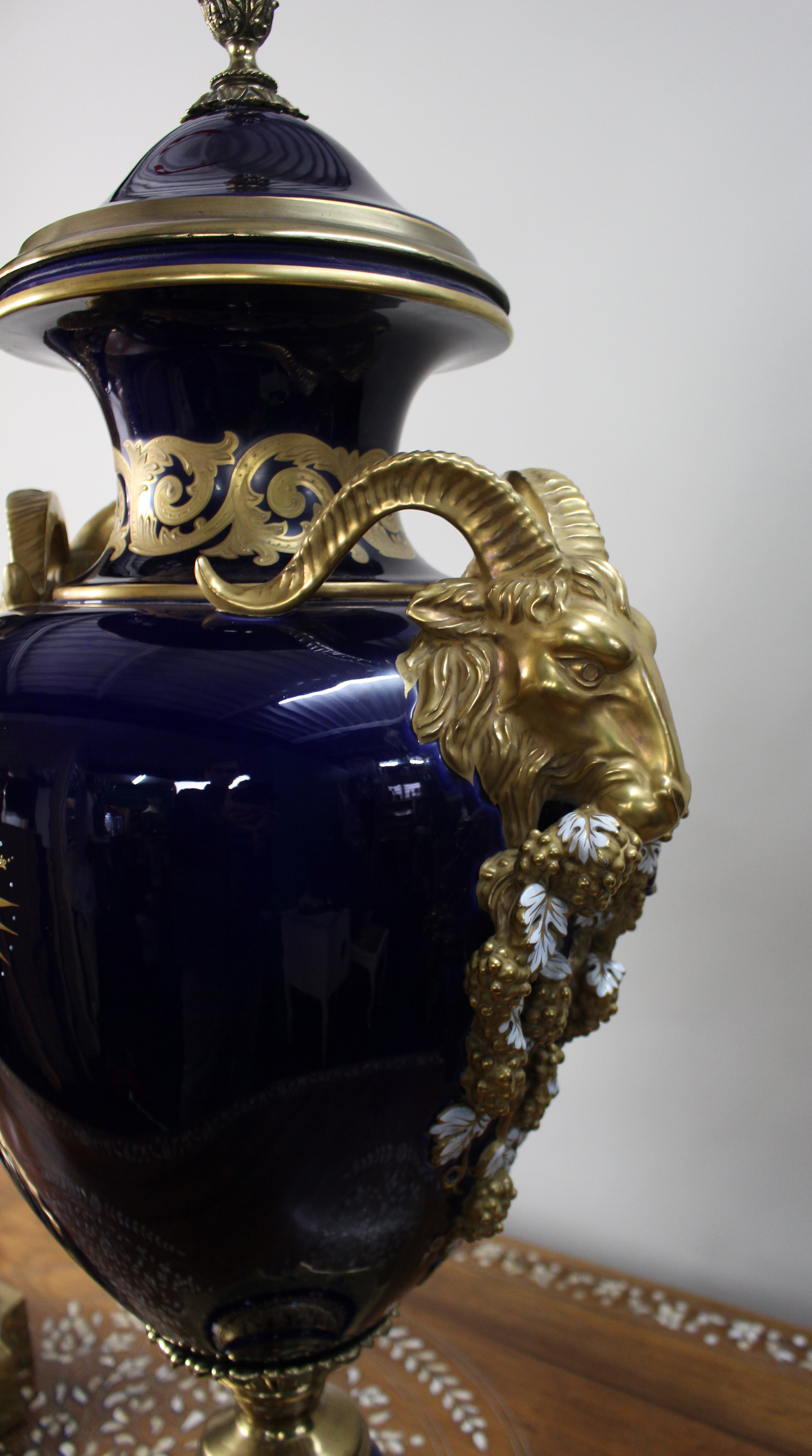 Pair of Fine Sevres Style Cobalt Blue Rams Head Lidded Urns