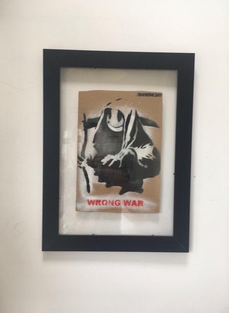 Banksy (b1974) ‘Wrong War’ & 6 Dismaland Bemusement Park Souvenirs Inc Framed Banksy Free Art, 2015