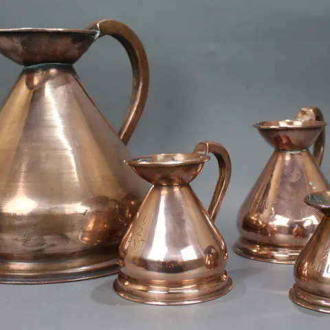 Set of 4 Antique Graduated Copper Jugs