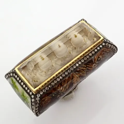 An Exquisite Handmade Ring, Detailed With Topaz and Featuring A Reverse-Engraved Intaglio With A Rel