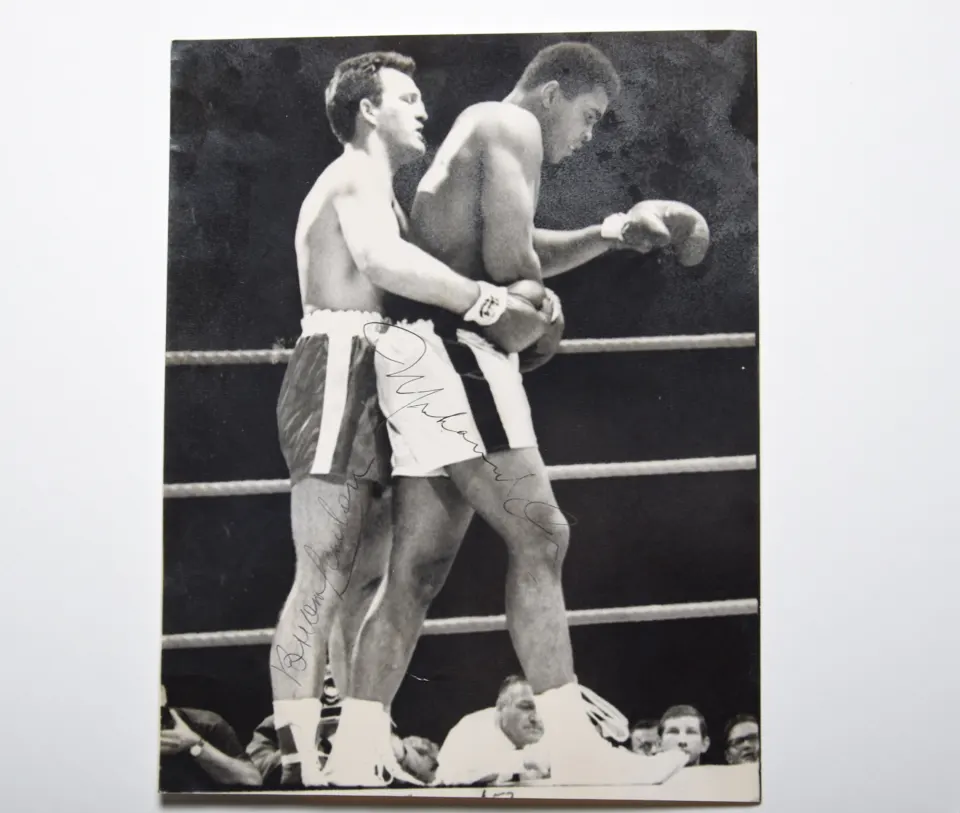 Muhammad Ali v Brian London black & white photograph with original signatures.