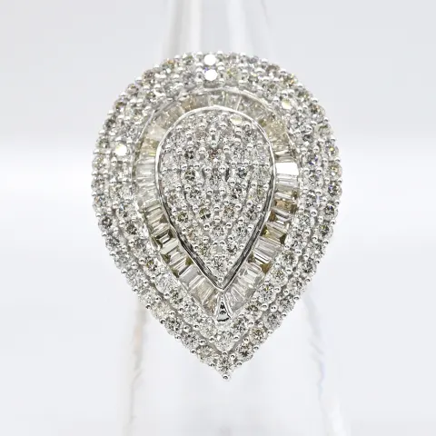 Large and impressive white gold tear drop-shaped 3.18 carat diamond cocktail ring