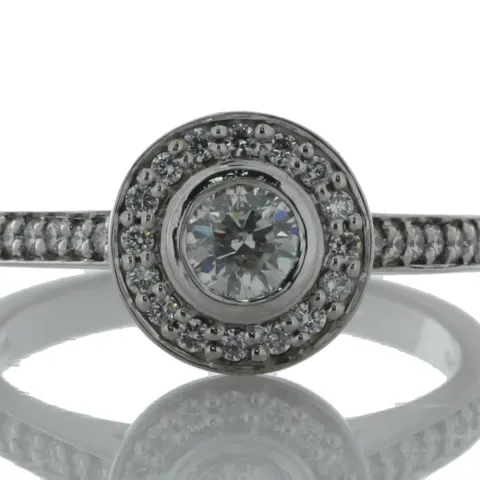 18ct White Gold Single Stone With Halo Setting Ring (0.26) 0.54 Carats