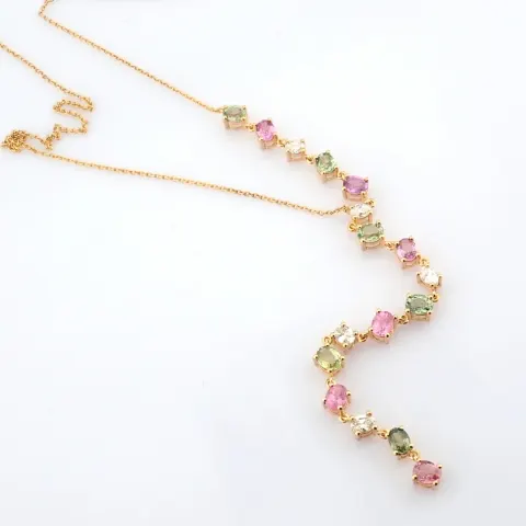An exquisite 18K rose gold necklace  detailed with rainbow sapphire and brilliant diamonds