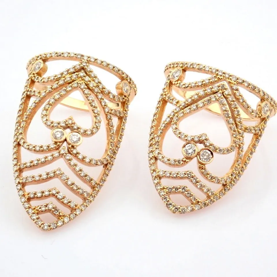 18K rose gold double ring detailed with brilliant diamonds