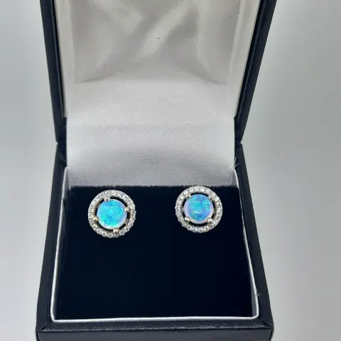 Silver and Synthetic Opal Stud Earring With CZ Halo