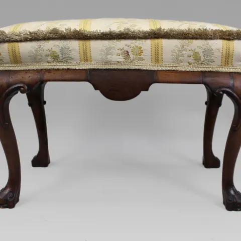 Carved Walnut Upholstered Footstool, c. 1900-1910