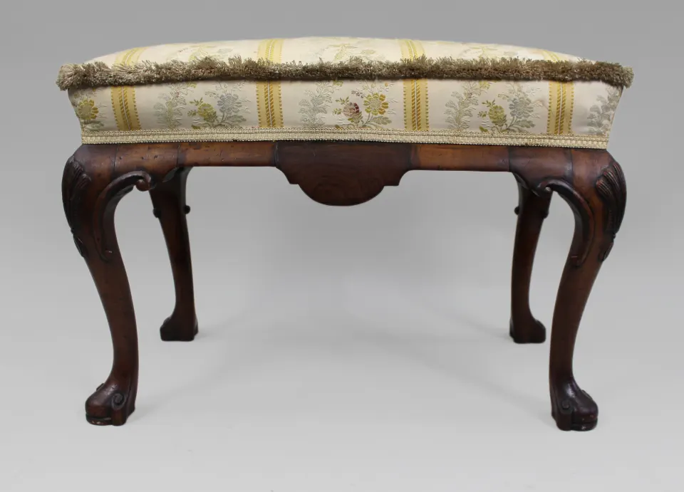 Carved Walnut Upholstered Footstool, c. 1900-1910