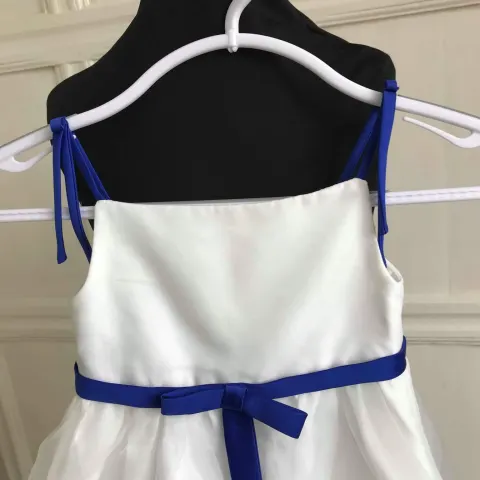 Ivory flowergirl dress with cobalt belt.  Age 2