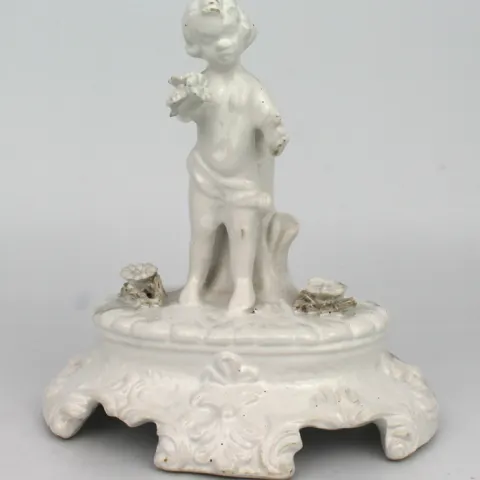 Painted White Porcelain Cherub Figurine