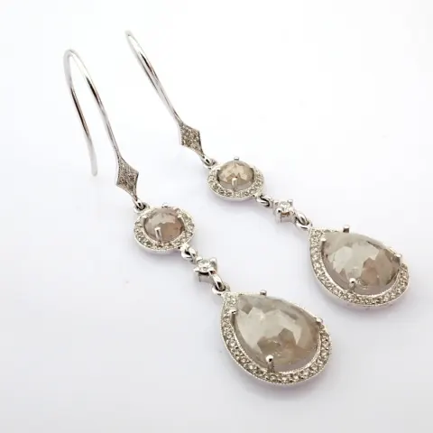 18K White Gold Earrings Detailed With Slice Cut Rough Diamond In The Centre and Brilliant Diamonds O