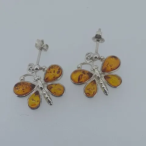 Silver butterfly drop earring set with natural amber