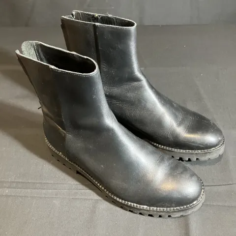 COS Boots worn by Remy Hii