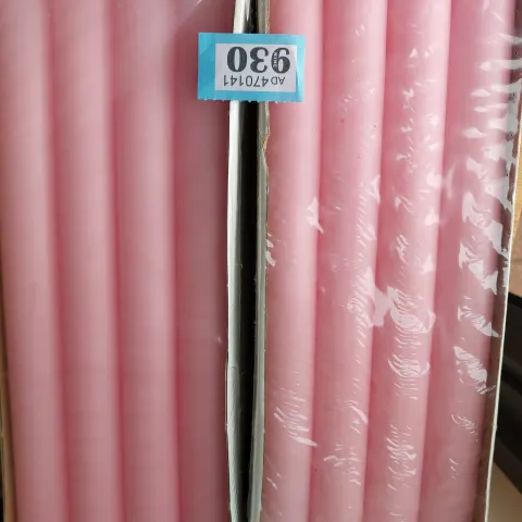 2 boxes of 8 long pink candles