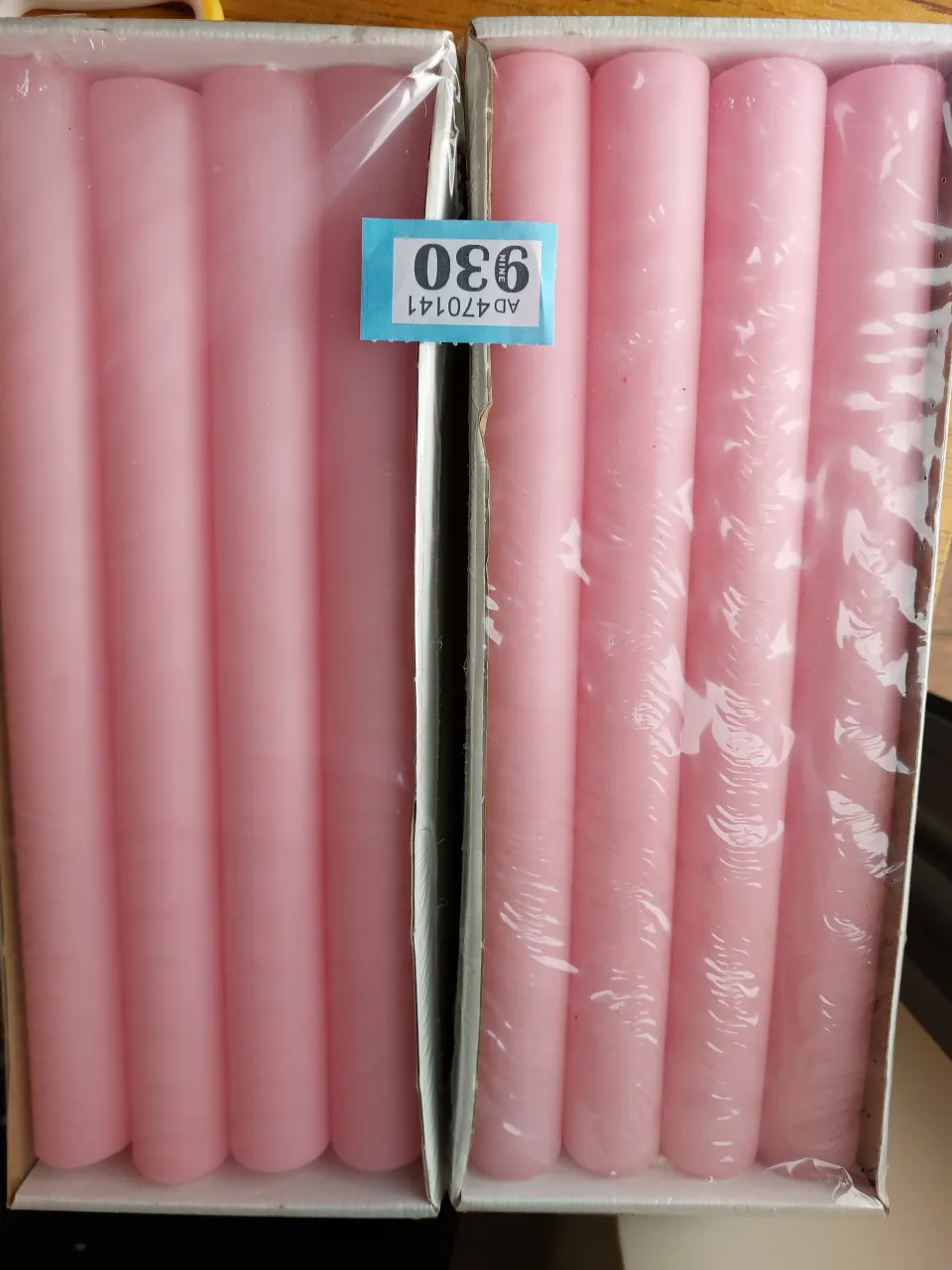 2 boxes of 8 long pink candles