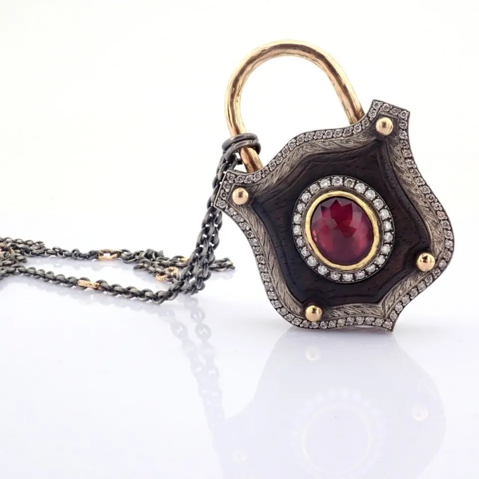 Convertible clasp necklace with gold, vibrand tourmaline, ebony-carved and diamonds on silver