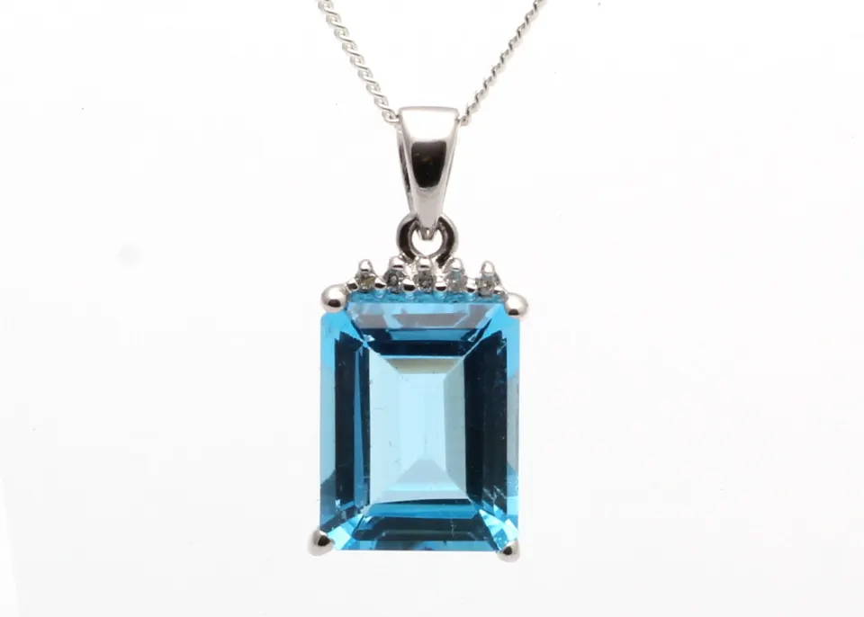 9ct White Gold Diamond And Blue Topaz Pendant 0.01