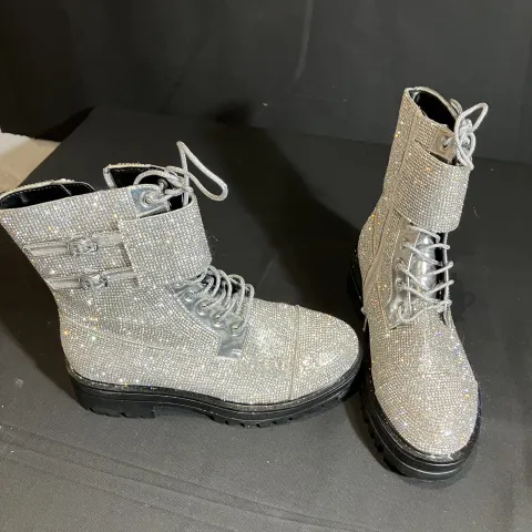 Dune Peach Silver boots worn by Mia Lloyd
