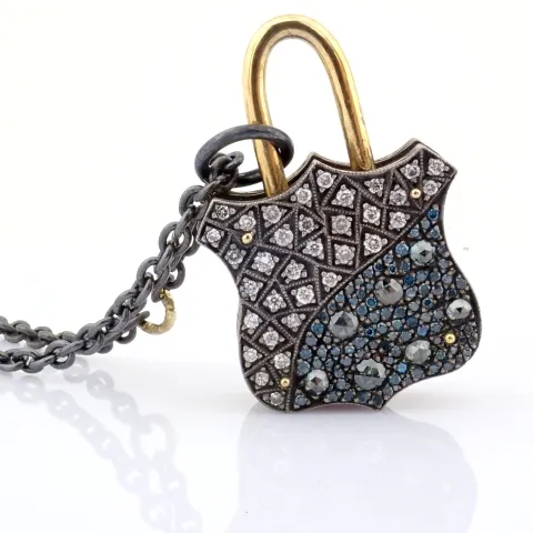 An Exquisite, Convertible Clasp Necklace Embellished With Gold and Diamonds On Silver