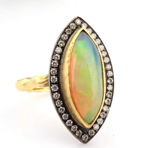 18K Ring Detailed With Opal and Brilliant Diamonds On A Silver Frame