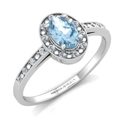 9ct White Gold Oval Cluster Diamond And Blue Topaz Ring (BT0.58) 0.09 Carats